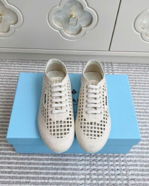 Prada Collapse Crochet Knit Sneakers in Ivory Women's Shoes