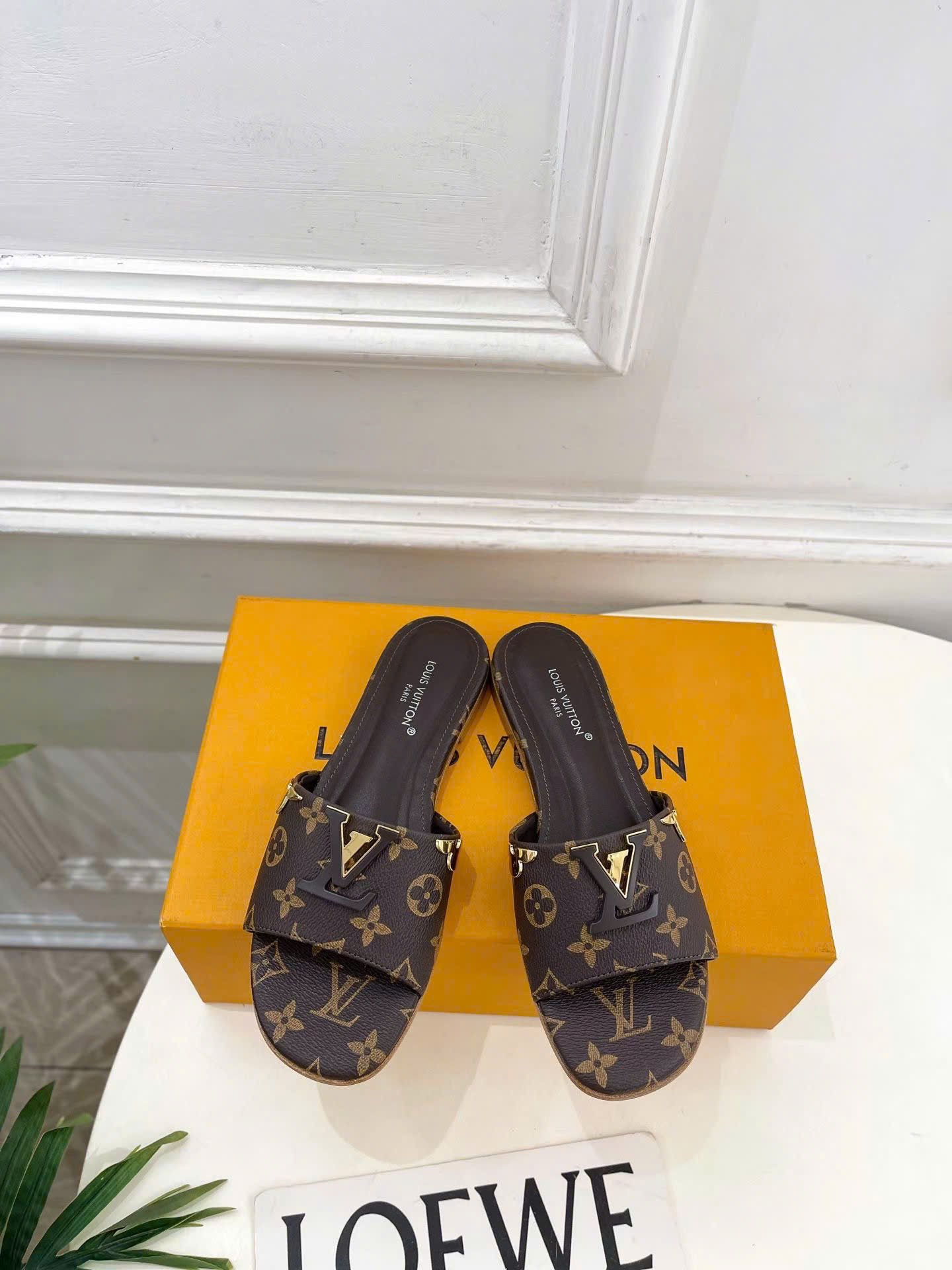 Louis Vuitton Lock It Flat Mules Monogram