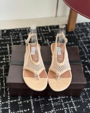 Alaïa Flex Mesh Thong Sandals in Patent Leather