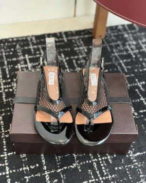 Alaïa Flex Mesh Thong Sandals in Patent Leather