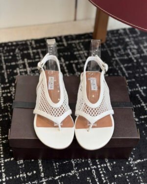 Alaïa Flex Mesh Thong Sandals in Patent Leather